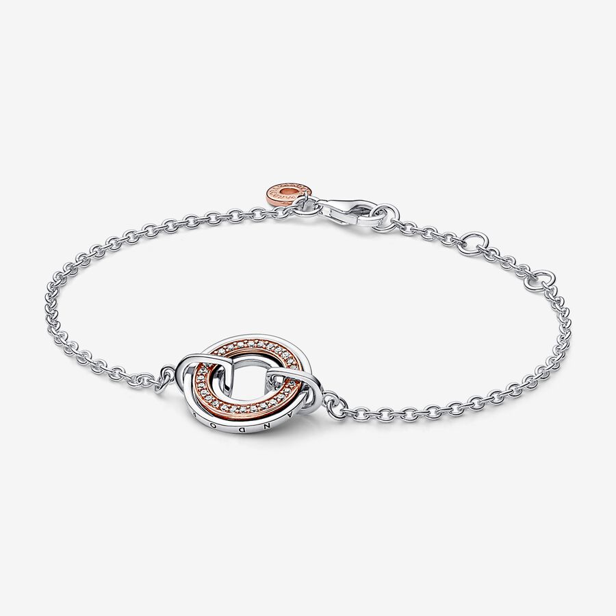 Pandora logo sterling silver and 14k rose gold-plated bracelet with clear cubic zirconia image number 0