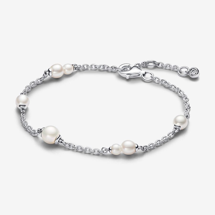 Sterling silver bracelet with white treated freshwater cultured pearl and clear cubic zirconia image number 0