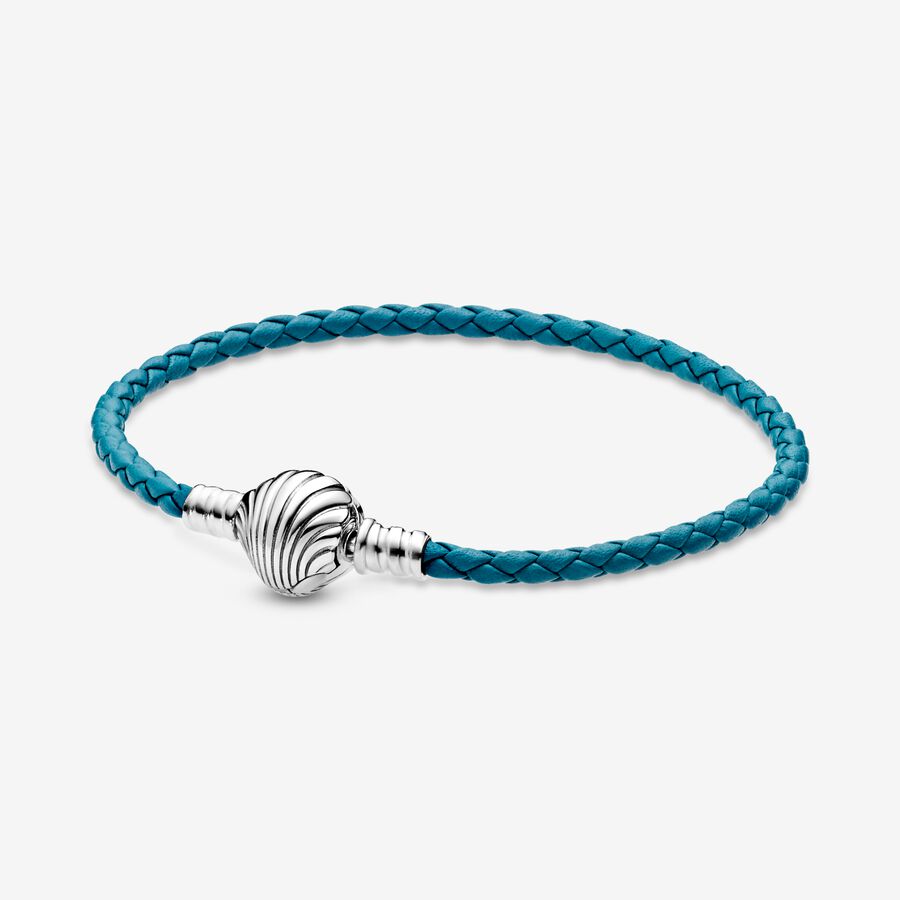 Sterling silver turquoise braided leather bracelet and shell clasp image number 0