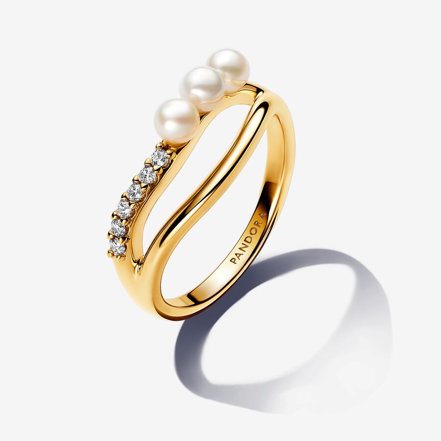 14k Gold-plated ring with white treated freshwater cultured pearl and clear cubic zirconia image number 0