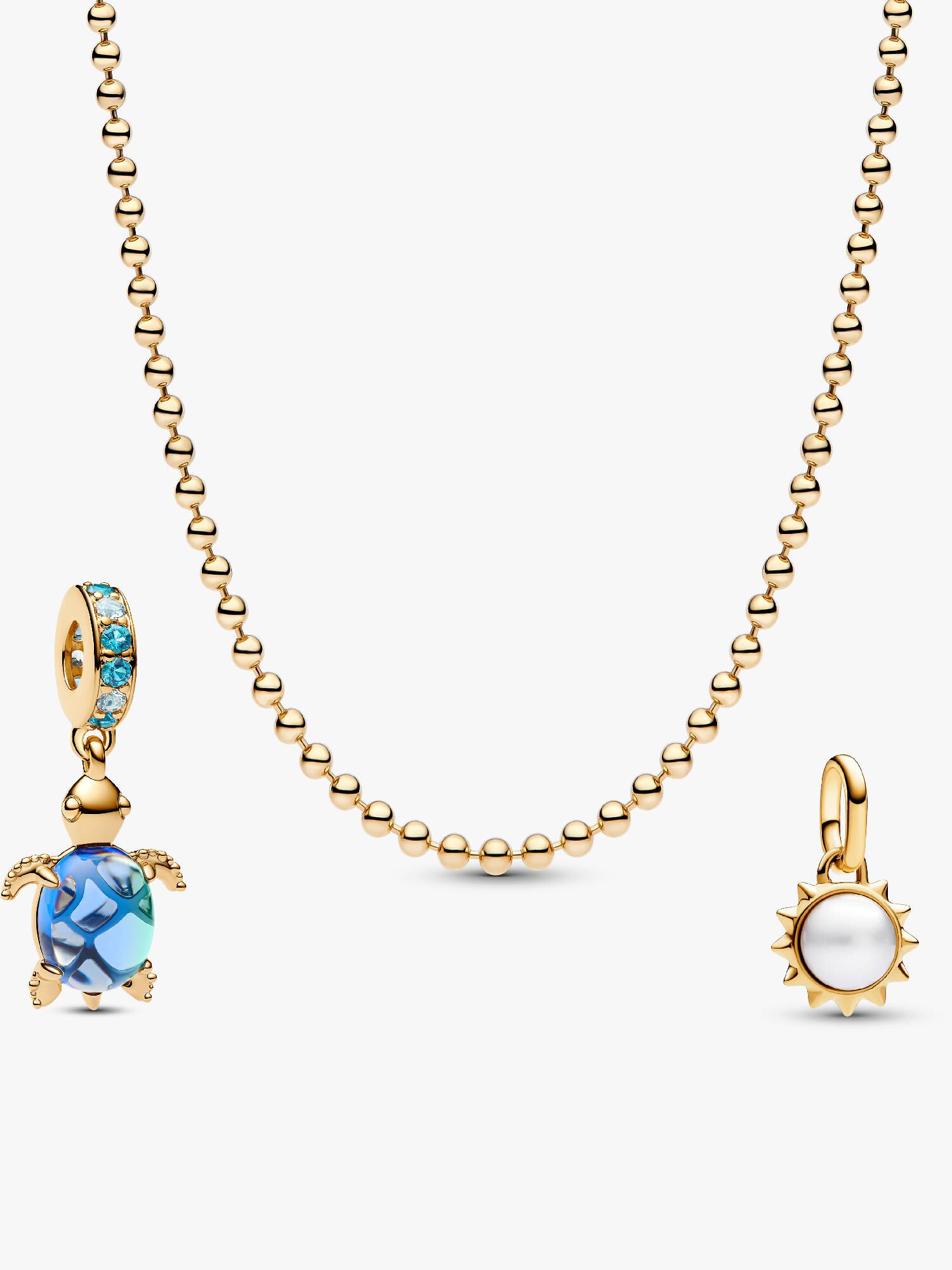 Sieradenset schildpad en zon bedelketting