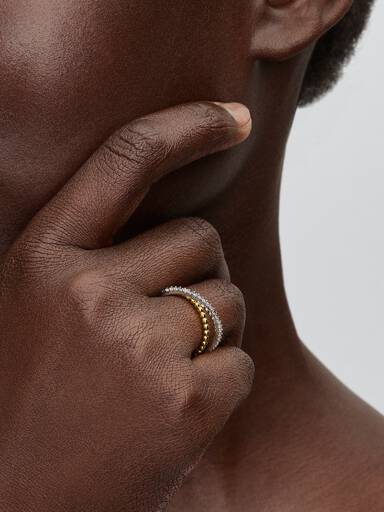 Gelinkte kralen en pavé dubbele bandring