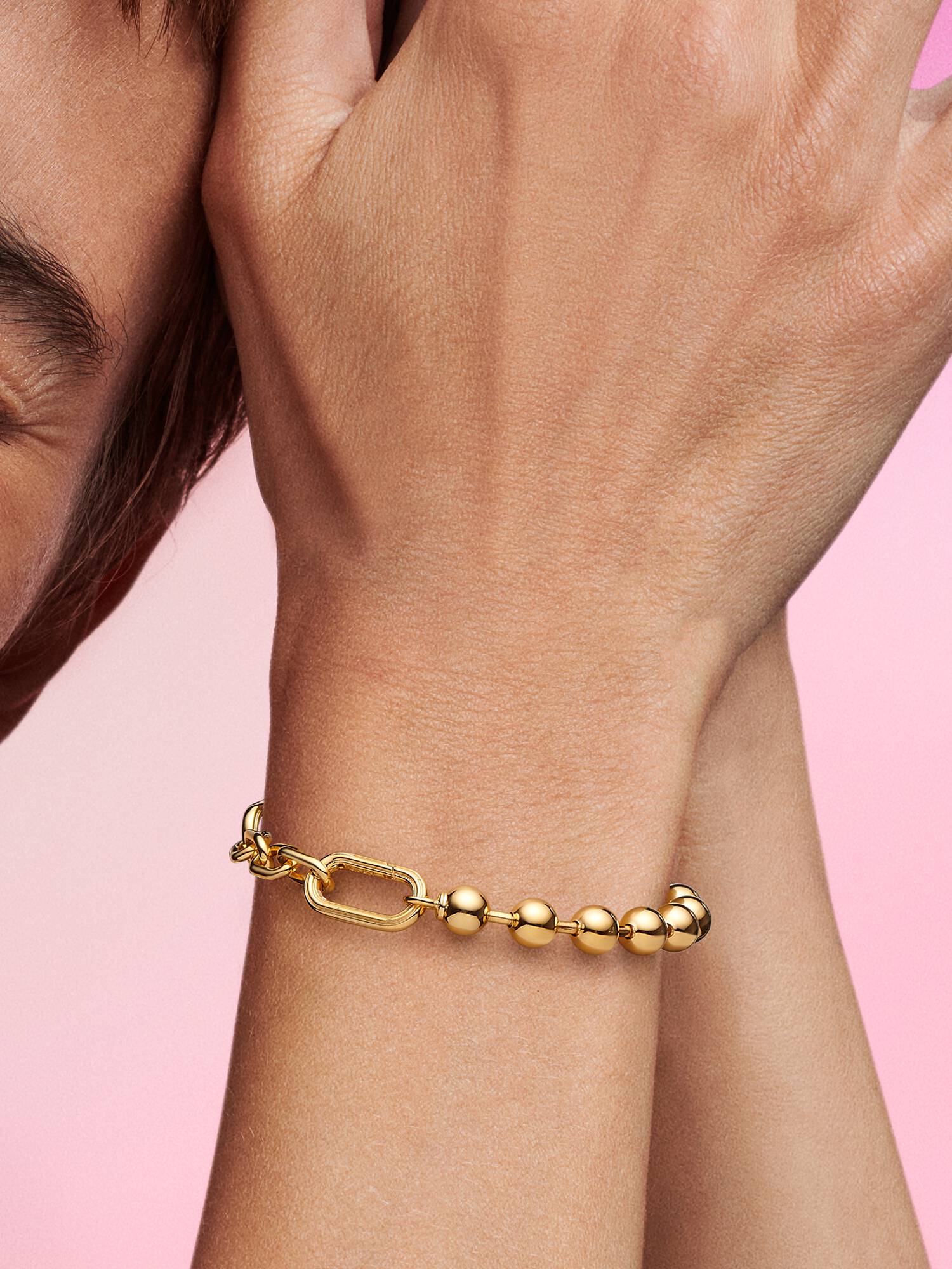 Metalen kralen- en schakelarmband
