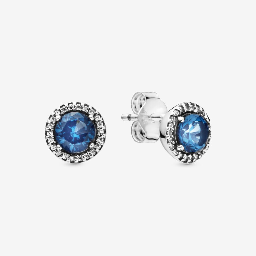Sterling silver stud earrings with moonlight blue crystal and clear cubic zirconia image number 0