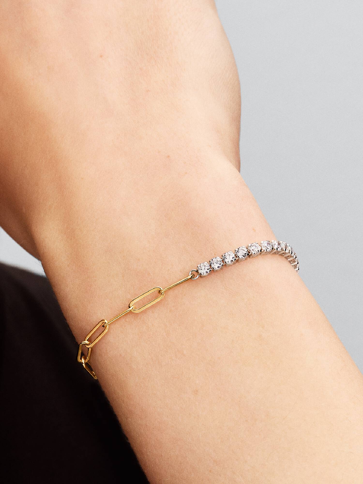 Schakel- en tennisarmband