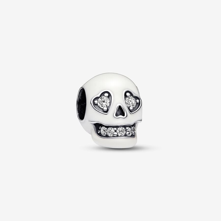 Skull sterling silver charm with clear cubic zirconia and white glow in the dark enamel image number 0