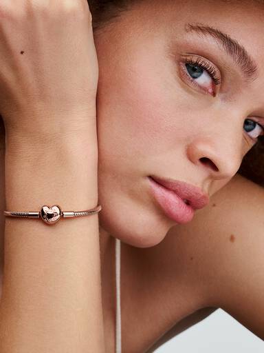 Slangenschakelarmband met hartvormige sluiting