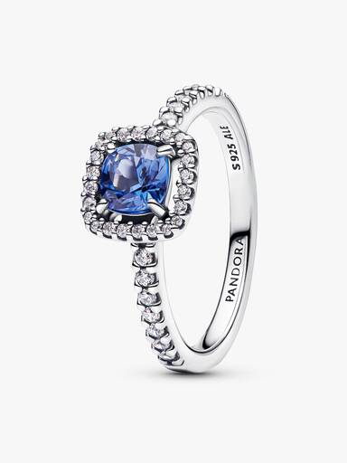 Sprankelende ring met vierkante blauwe halo