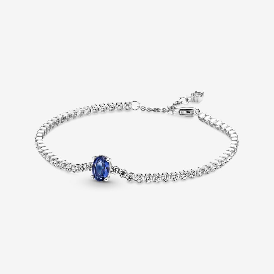 Sterling silver tennis bracelet with princess blue crystal and clear cubic zirconia image number 0